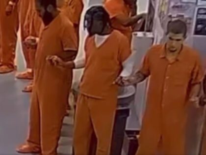 Inmates Praying on Christmas Eve 2