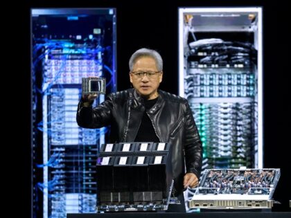 Jensen Huang of Nvidia holding chips bound for China