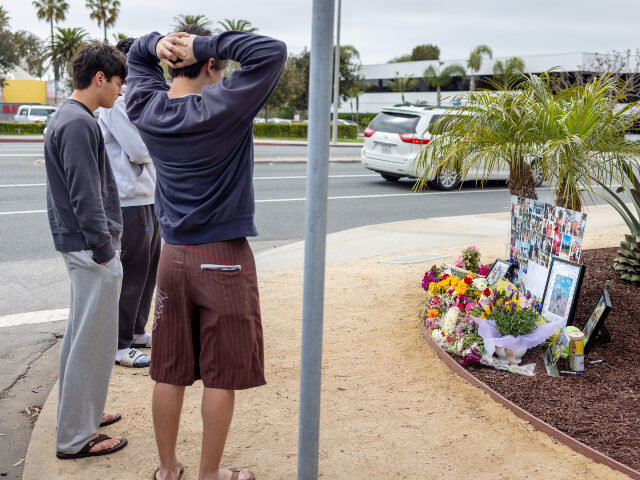 Students from Loyola High School are seen at a memorial for their friend Braun Levi on May