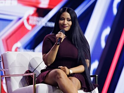 PHOENIX, ARIZONA - DECEMBER 21: Surprise guest Nicki Minaj is interviewed by Erika Kirk on