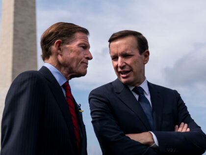Sen. Richard Blumenthal, left, (D-CT) and Sen. Chris Murphy (D-CT) chat with each other wh