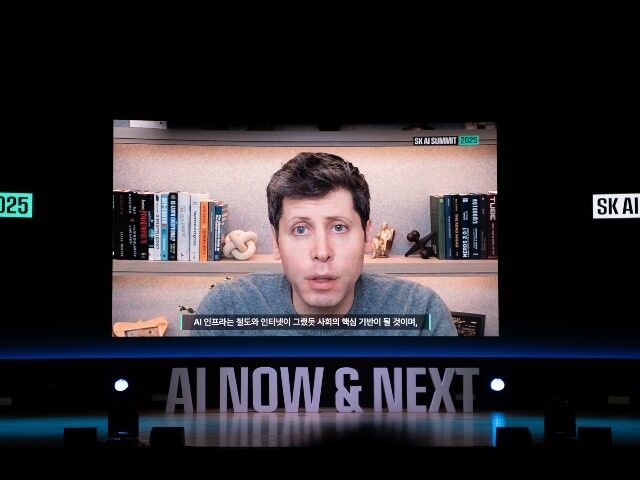 Sam Altman speaks on screen