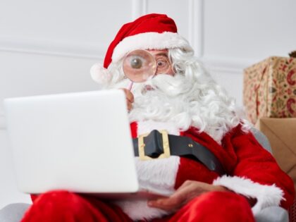 Santa surprised by laptop