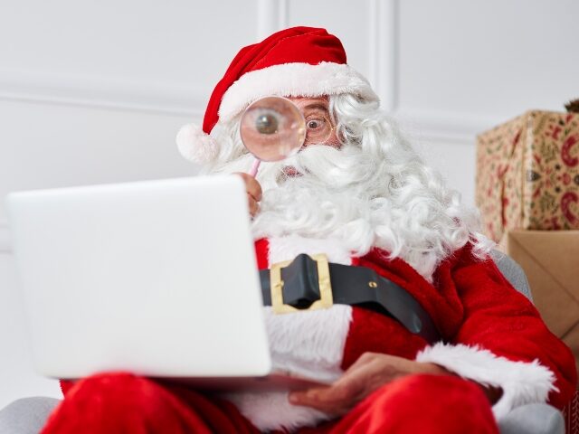Santa surprised by laptop