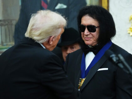 Trump Gives Medallion to Gene Simmons U.S. President Donald Trump (L) presents musician Gene Simmons (R) of the rock band KISS a