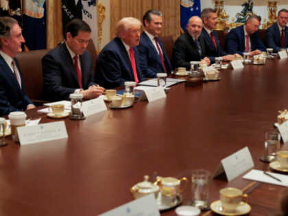U.S. President Donald Trump (C) speaks during a meeting of his Cabinet in the Cabinet Room