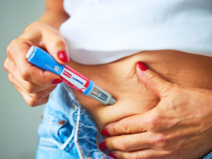 Woman Gives Ozempic Injection A photo illustration of a woman with Ozempic injection pen on October 21, 2025 in London,