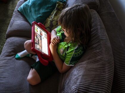 Young Child watching AI Slop on YouTube