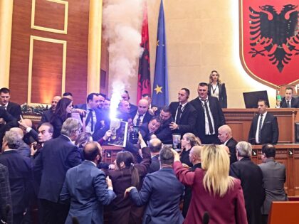 TIRANA, ALBANIA - DECEMBER 18: Opposition law makers of Democratic Party of Albania light