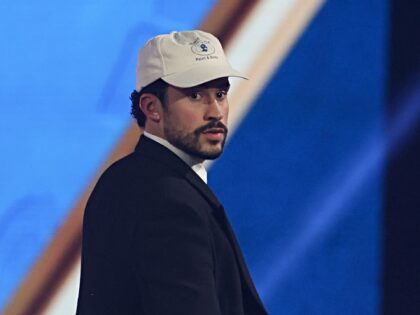 Puerto Rican singer Bad Bunny leaves the stage after winning the Album of the Year award f