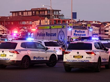 bondi rescue Police vehicles are seen on a road after a shooting incident at Bondi Beach in Sydney on D