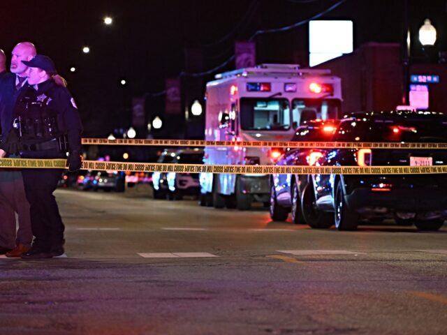 CHICAGO, ILLINOIS, UNITED STATES - APRIL 13: Police officers and officials arrive to inspe