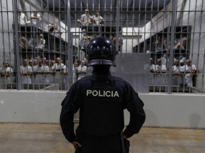 el-salvador-CECOT-tecoluca-fileFeb24-getty SAN VICENTE, EL SALVADOR - FEBRUARY 6: An officer in riot gear stands on patrol inside a c