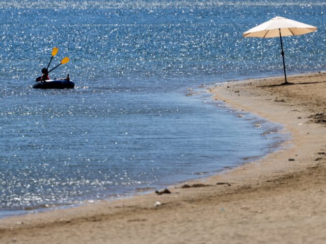 lake fatality Perris, CA - September 04: Amid hot temperatures reaching 110 degrees, a person seeks reli
