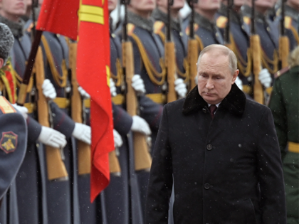 Russian President Vladimir Putin attends a wreath laying ceremony at the Tomb of the Unkno