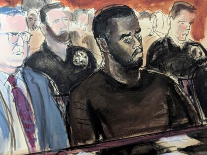 In this courtroom sketch, Sean Combs, center, is flanked by his defense attorney Marc Agni