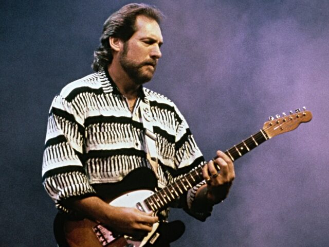 steve cropper American guitarist Steve Cropper playing a Fender Telecaster guitar on stage, circa 1990.