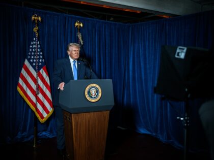trump-speech-podium-camera-white-house-flickr President Donald Trump addresses the nation on the shooting of two National Guard soldiers