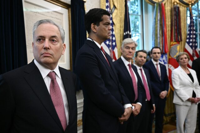 AI and crypto czar David Sacks looks on before US President Donald Trump signs executive o