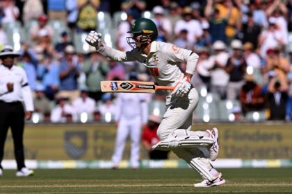 Alex Carey celebrates his hundred at Adelaide