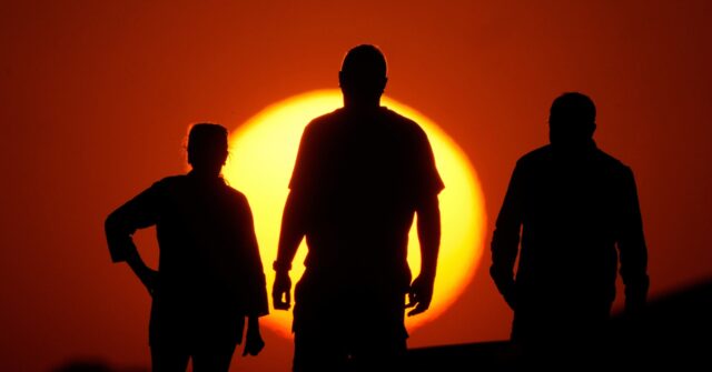 Researchers slightly lower study's estimate of drop in global income due to climate change