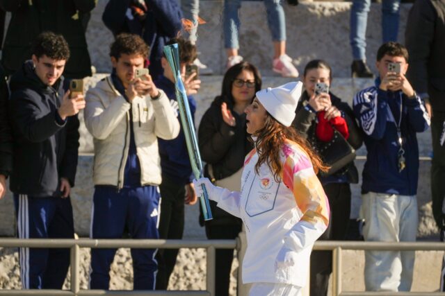 Italy Olympics Milan Cortina Flame The Associated Press