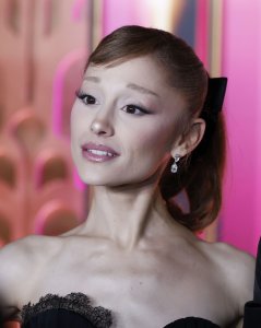 Ariana Grande cracks up during hilarious Christmas tree skit