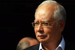 Former Malaysian PM gets 15 years for money laundering, abuse of power