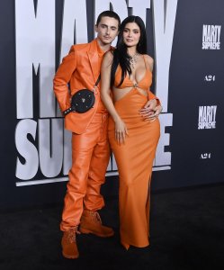 Timothee Chalamet, Kylie Jenner twin in orange at 'Supreme' premiere