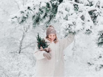 woman wearing white in the snow
