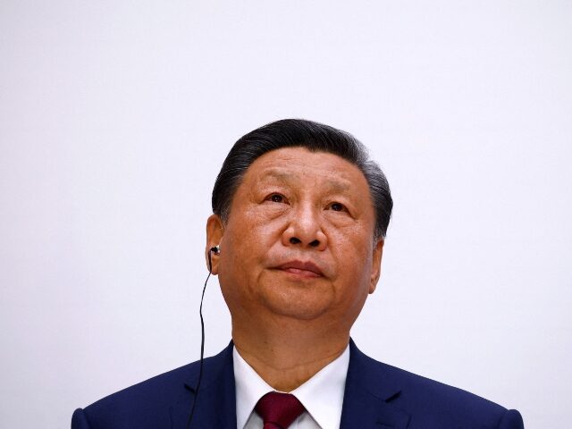 TOPSHOT - China's President Xi Jinping attends a joint statement with the French pres