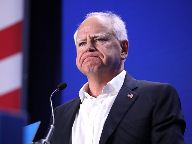 54033457357fe1f55f1aa Minnesota Governor Tim Walz speaking with supporters at a debate watch party at the Mesa C