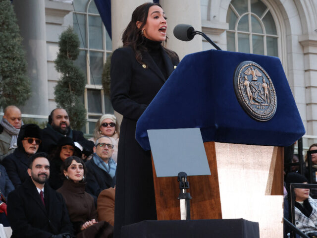 New York mayor Zohran Mamdani (L) and his wife Rama Duwaji listen to US Representative Ale