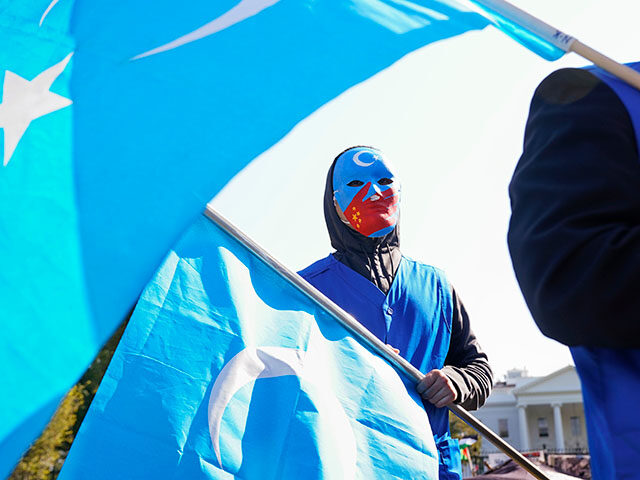 Title: Uyghur Forced Labor Prevention Act Image ID: 20275727529424 Article: A man wears a