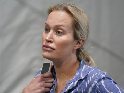 FILE - Christina Pushaw, press secretary for Florida Gov. Ron DeSantis, listens during a p