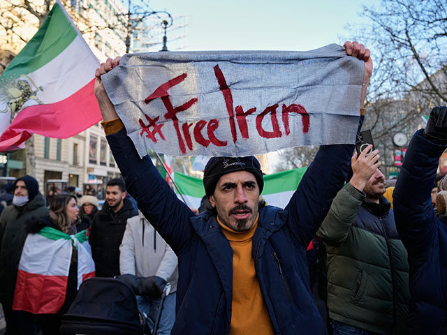 Title: Germany Iran Protest Image ID: 26010571559098 Article: Protesters participate in a