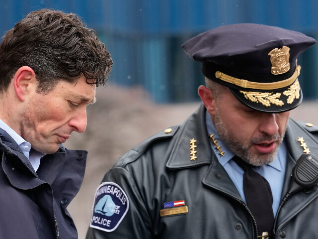 AP26010614053977 (1) Minneapolis Mayor Jacob Frey joins Police Chief Brian O'Hara during a news conference on S