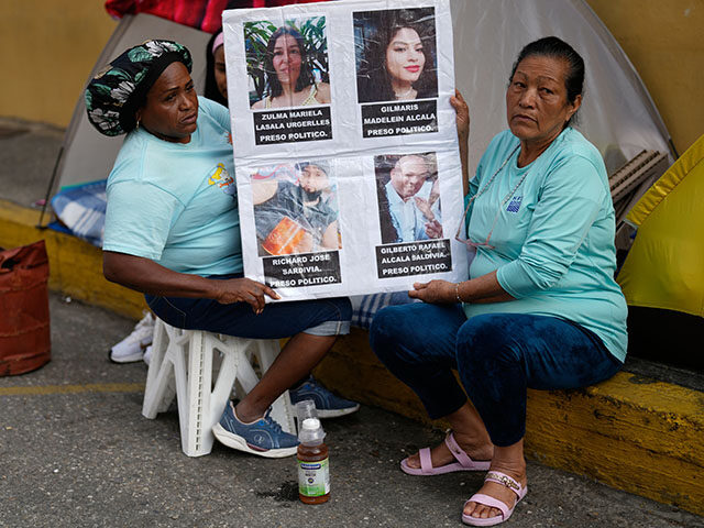 AP26019528601245 Title: Venezuela Prisoners Image ID: 26019528601245 Article: Marina Saldivia, right, holds