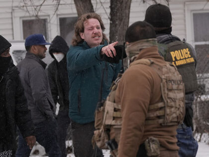 Title: Immigration Enforcement Minnesota Image ID: 26021750868603 Article: A person confro