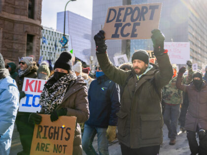 Demonstrators against the ongoing Immigration and Customs Enforcement (ICE) deployment mar
