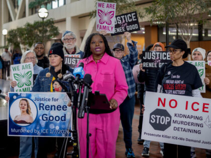 Nekima Levy Armstrong and other community leaders speak during a press conference in the l