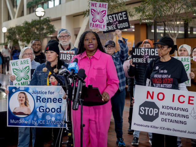 Nekima Levy Armstrong and other community leaders speak during a press conference in the l