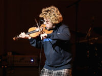 performs on stage at Tibet House Benefit Concert 2015 at Carnegie Hall on March 5, 2015 in