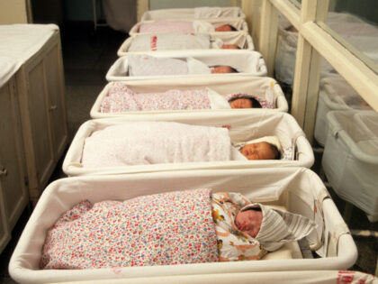 Chinese Babies View of a group of newborn babies in cribs at Youyi Hospital, Beijing, China, February 199