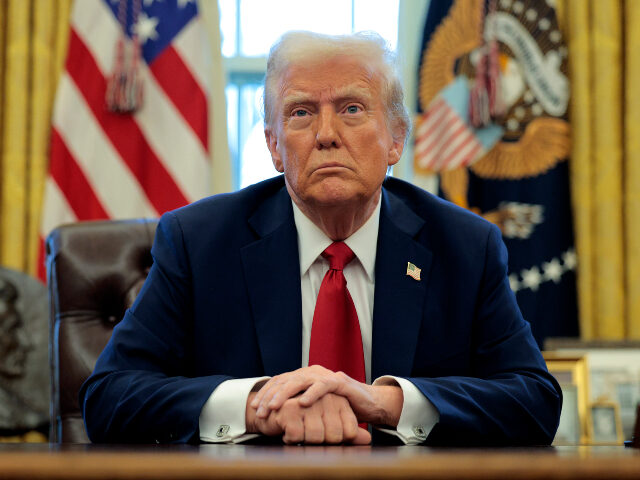 Donald Trump U.S. President Donald Trump talks to reporters from the Resolute Desk after signing an exe