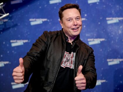 Elon Musk with double thumbs up