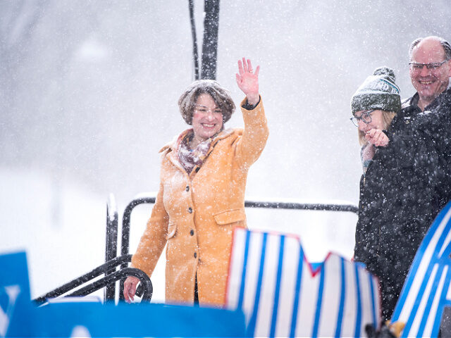 MINNEAPOLIS, MN - FEBRUARY 10: Sen. Amy Klobuchar (D-MN) is joined by her husband John Bes