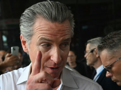 The Governor of California Gavin Newsom answers questions to an AFP journalist in the side