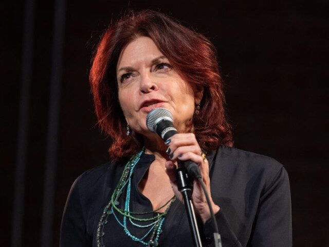 GettyImages-1429895548 Rosanne Cash performs during a farewell ceremony for the 12-foot puppet known as "Little A