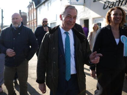FRODSHAM, ENGLAND - MARCH 24: Reform UK leader, Nigel Farage and candidate Sarah Pochin (R